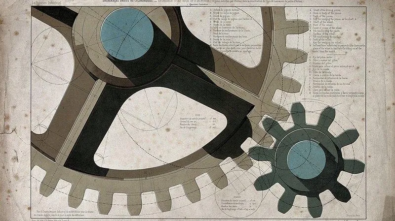 Interlocking engineering gears on a technical drawing